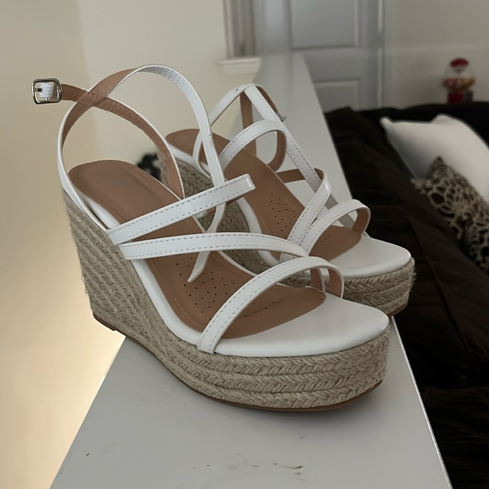 New, white platform sandals.
